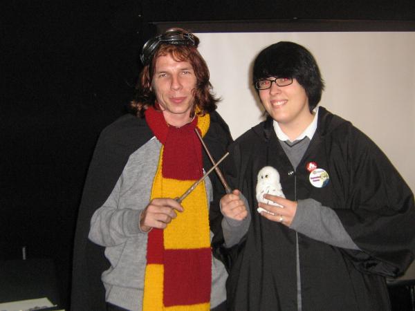 A Ron Weasley and Harry Potter minding a stall.