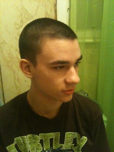 I decided, in preparation for the NAVY, that it was time to get my hair cut. Now, normally I would have gone to Fantastic Sam's, or some other Stylist shop, so this time I decided to do it myself. Grabbing a thick shaver, I added the guard, and buzzed my head. Do I look good, or what?