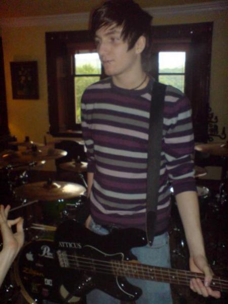 Me at a band practice. The instruments have names. This bass is Stephanie. Don't ask why.