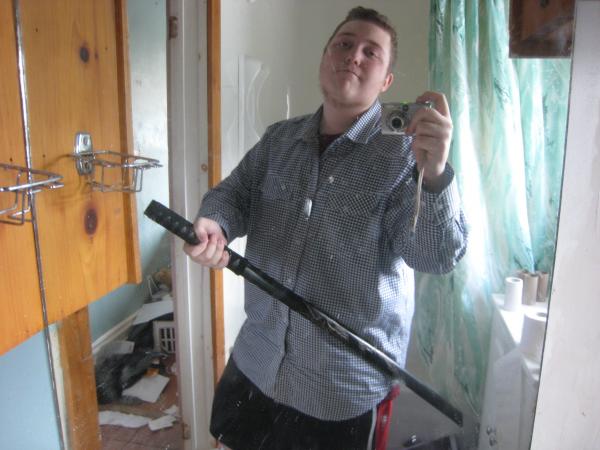 Me And My Brand New Full Black Bokken Katana(Wooden Practice Samurai Sword) With Etching Of A Dragon On It.