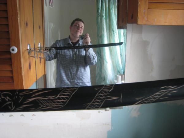 Me And My Brand New Full Black Bokken Katana(Wooden Practice Samurai Sword) With Etching Of A Dragon On It.