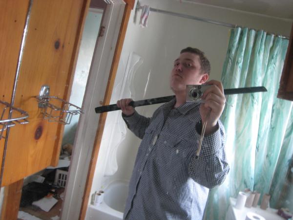 Me And My Brand New Full Black Bokken Katana(Wooden Practice Samurai Sword) With Etching Of A Dragon On It.

Haha ^_^  :P