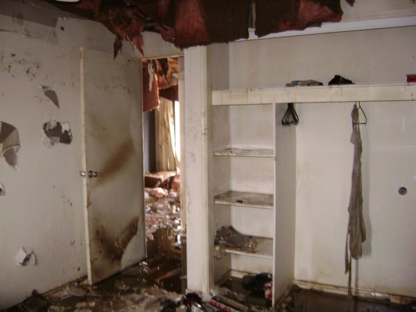 My bedroom, there was a computer monitor in the bottom of the cupboard, it was on the top shelf of the cupboard when I first opened it :O

Our mattress had been turned over completely.
