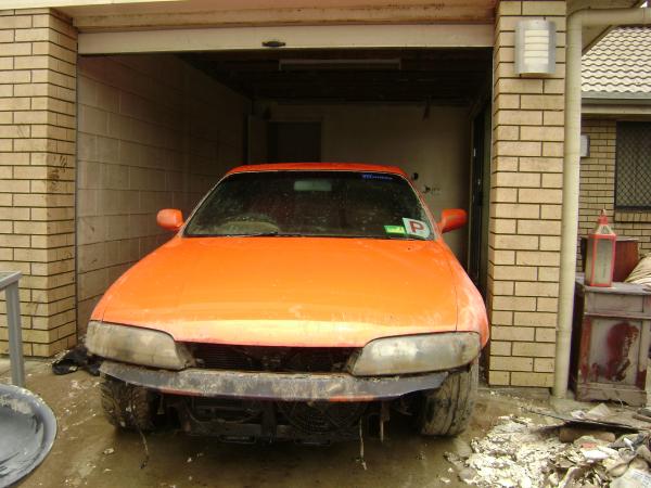 My boyfriend crashed his car the morning before the flood, he couldn't fix it in time and we had no access to a tow truck. So it was in the garage, closed up for 3 days in yucky stinky flood water. Ewww.